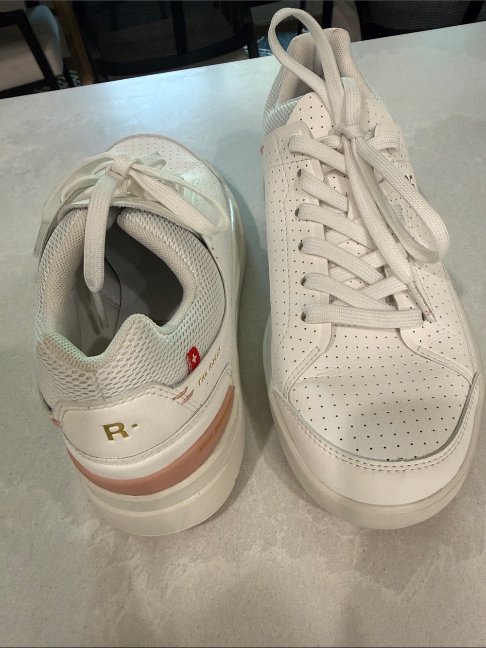On Cloud . The Roger Women's Perforated Leather Sneakers